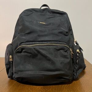 Tumi Black Backpack with Gold Details